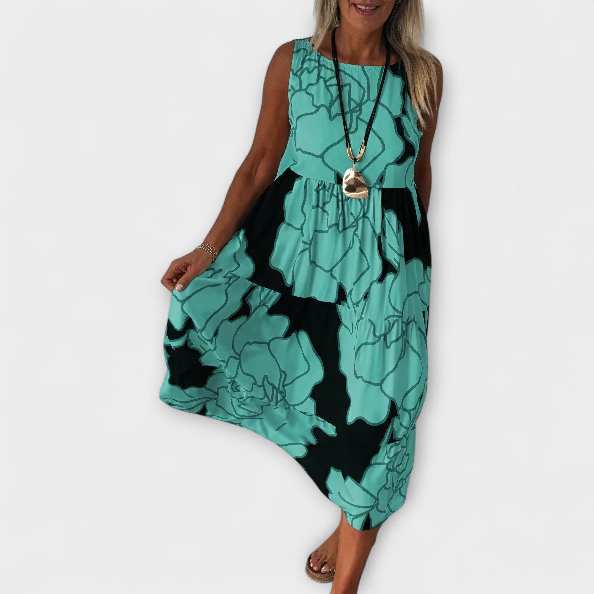 Rochie midi înflorată cu fustă în trepte