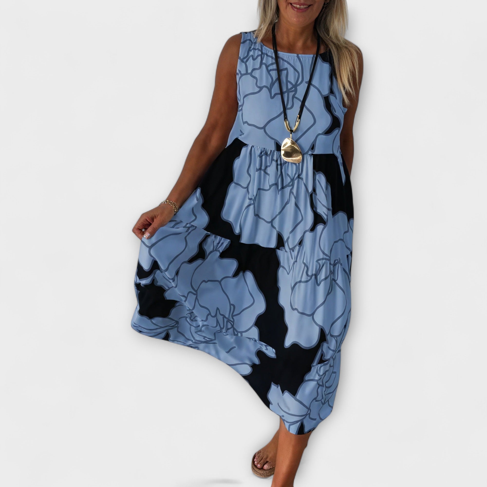 Rochie midi înflorată cu fustă în trepte